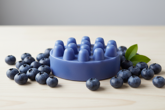 blue berry oval massage soar bar surrounded by blueberries