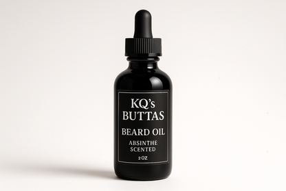 KQ's BUTTAs absinthe scented beard oil in a 2os black glass bottle