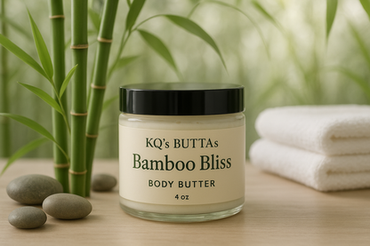 KQ's BUTTAs Bamboo Bliss 4oz Body Butter surrounded by bamboo in a serine spa like environment