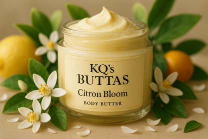 KQ's BUTTAs Citron Bloom Body Butter in a jar with a citrus bloom