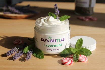 KQ's BUTTAs Lavermint Body Butter open jar 4 oz surround the jar with lavender and peppermint leaves and candies