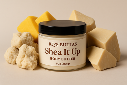 KQ's BUTTAs Shea It Up 4 oz Body Butter Surrounded by Shea, Mango, and cocoa butters